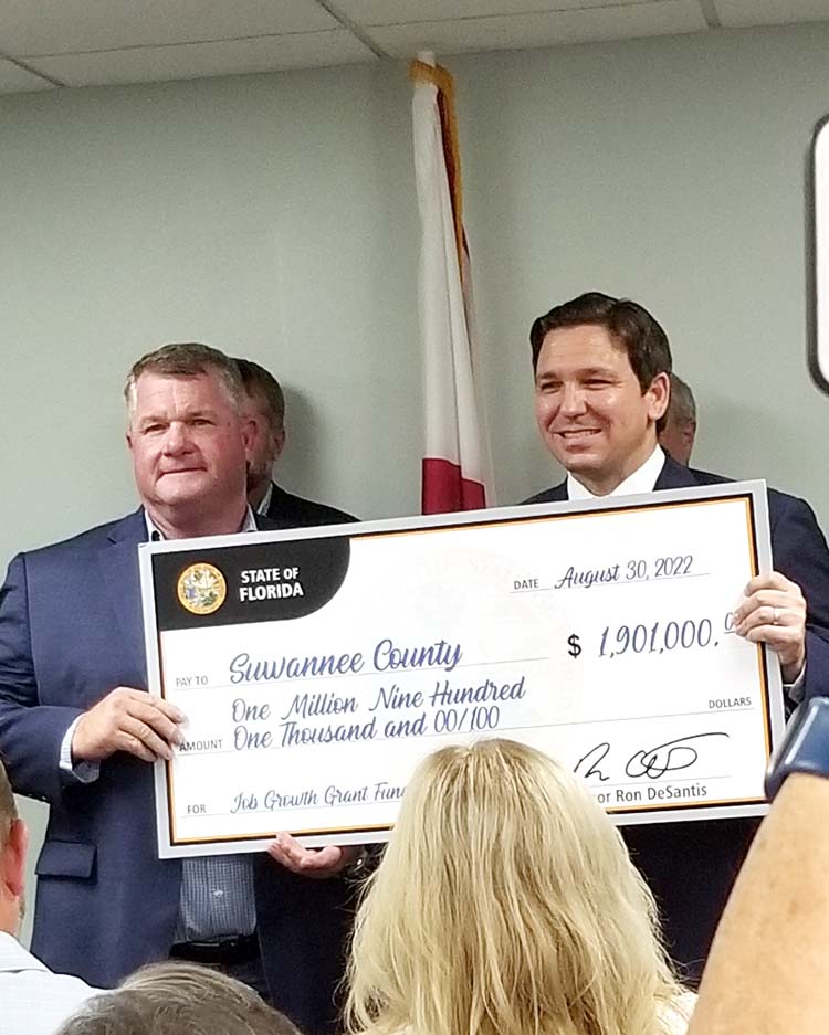 Governor DeSantis presents check to Suwannee County